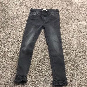 Levi’s: Black Jeans with Ruffles on the end